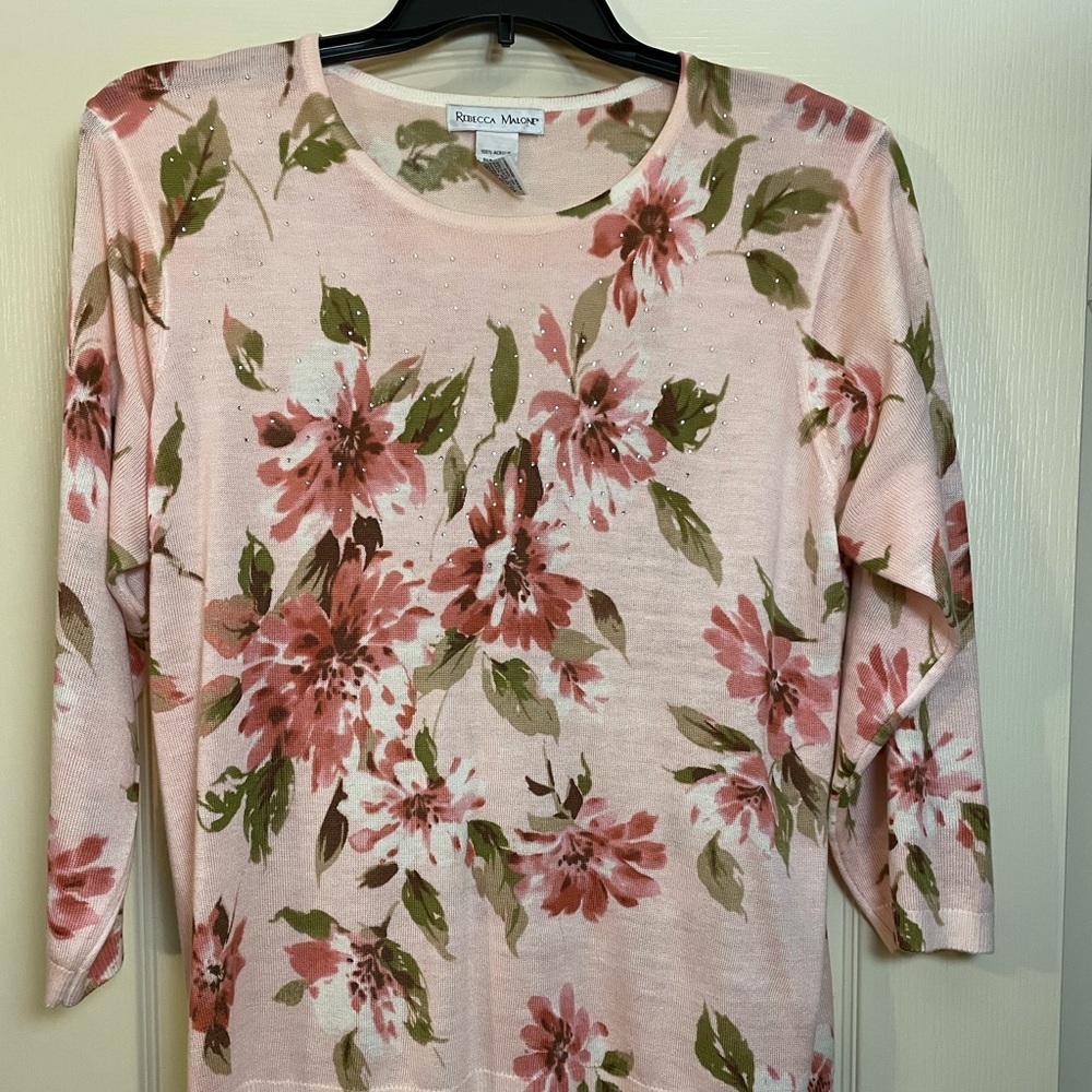 Beautiful embellished light sweater Never worn. 26 in long, under arm 23 in.